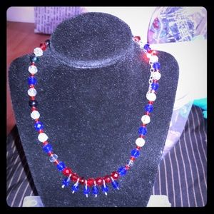selling a beautiful red white n blue necklace